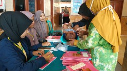 Giat Rutin Posyandu Desa Pandan, KKN - 21 Unira Ikut Serta Mendampinginya